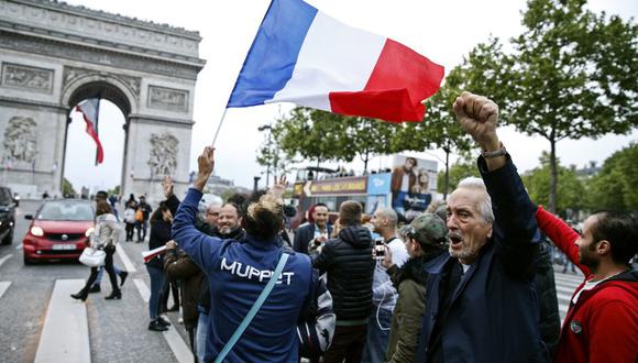 LREM se sitúa todavía ligeramente como primer partido de Francia, con el 21,5 %, pero seguido muy de cerca por la RN, con un 21 %. (Foto: AFP)