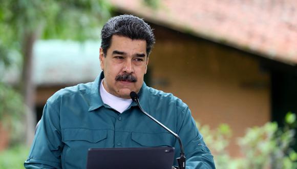 En esta imagen distribuida por la oficina de prensa del palacio presidencial de Miraflores se muestra a Nicolás Maduro, hablando durante un acto oficial. (Foto de Handout / AFP)