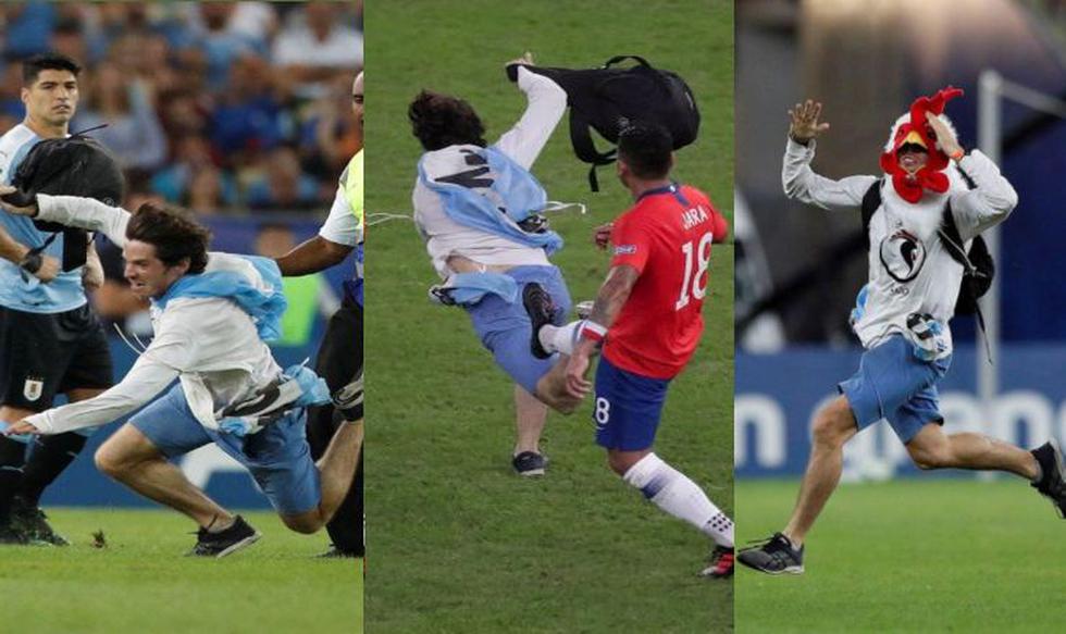 Gonzalo Jara derribó a hincha que se metió al campo en el duelo Chile vs. Uruguay. (Foto: Agencia)