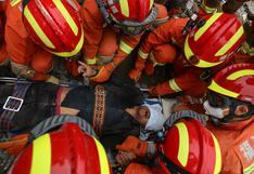 China: Rescatan a hombre luego de permanecer 69 horas bajo los escombros de un hotel