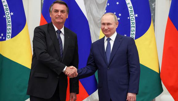 Bolsonaro se reunió hace dos semanas con Putin en su visita a Rusia. Tras el encuentro, el mandatario aseguró que su par ruso buscaba la “paz”. (Photo by Mikhail Klimentyev / Sputnik / AFP)