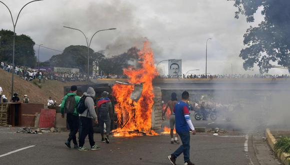 También se reportó que solo el 23 de enero, cuando cientos de miles de venezolanos se manifestaron en todo el país contra el Gobierno de Nicolás Maduro, hubo 696 arrestos. (Foto: AFP)