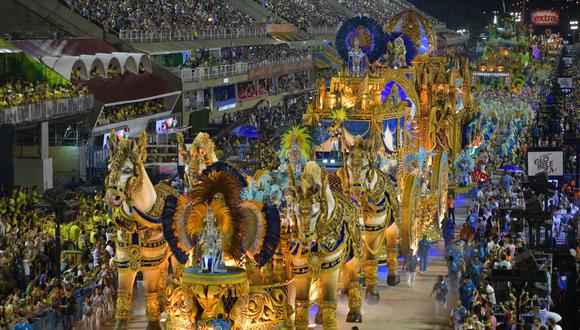 El Carnaval es el principal evento turístico de Río y el año pasado atrajo a 2,1 millones de visitantes, de los que 483.000 extranjeros, que dejaron ingresos por 900 millones de dólares y confirmaron a la ciudad como principal destino turístico de Brasil. (Foto: AFP)