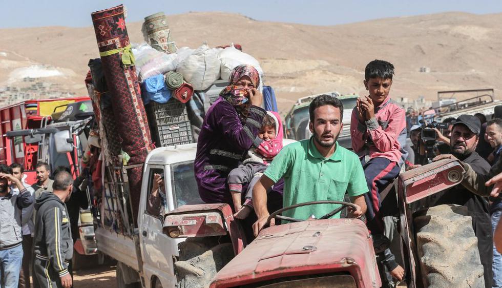 400 sirios refugiados en la localidad libanesa de Arsal (noreste), partió hacia Siria tras recibir la aprobación del Gobierno sirio. (Foto: EFE)