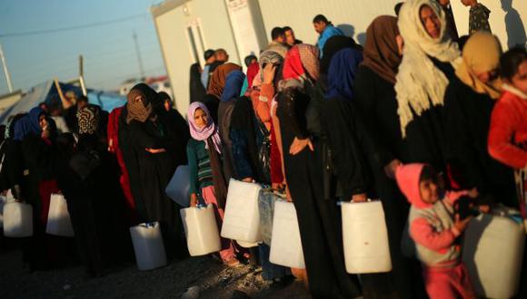 Cerca de 68,000 personas han huido de la ciudad de Mosul , Irak. (REUTERS)
