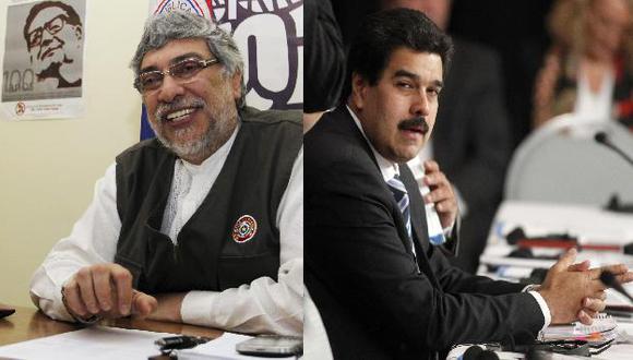 Maduro (derecha) se reunió con militares cuando procesaban a Lugo.  (Reuters)