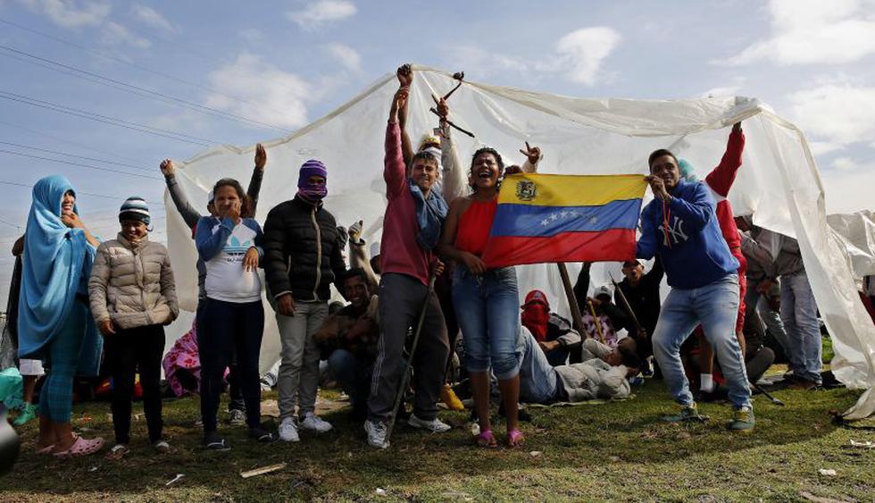 Migrantes venezolanos son reubicados en un campamento de Bogotá entre protestas | Foto: EFE