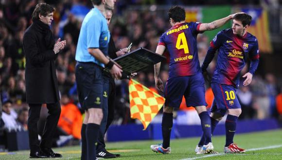 CLAVE. Vilanova aplaude  a Messi. ‘Lío’ se resintió de su lesión en el muslo, pero llegará a ‘semis’. (AP)