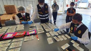 Callao: Incautan US$250 mil falsos en billeteras y portarretratos que iban a ser enviados a EE.UU.
