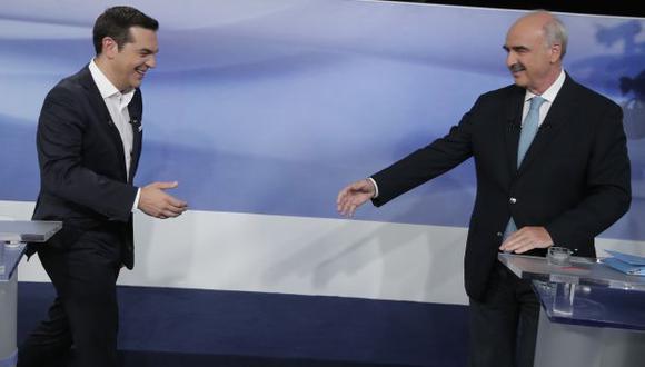 Empatados. Alexis Tsipras, líder del izquierdista Syriza, y Evangelos Meimarakis, conservador de Nueva Democracia, disputan el gobierno. (AP)
