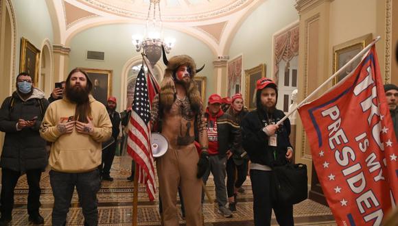 Los partidarios del presidente de los Estados Unidos, Donald Trump, ingresan al Capitolio. (Foto de Saul LOEB / AFP).