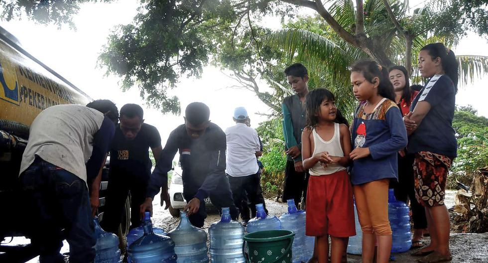 Varias personas han recibido el apoyo del estado tras las fuertes lluvias en Indonesia. (AFP)