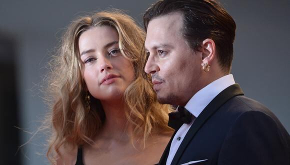 Amber Heard y Johnny Depp se encuentran enfrentados en una millonaria demanda por difamación. (Foto: Giuseppe Cacace y Tiziana Fabi para AFP)