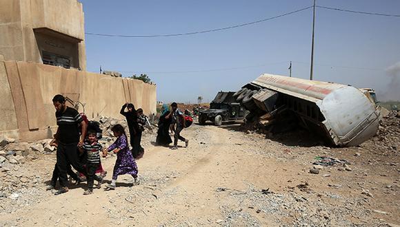 El Estado Islámico asesinó a más de 145 civiles que intentaban huir de la ciudad iraquí de Mosul (AFP)