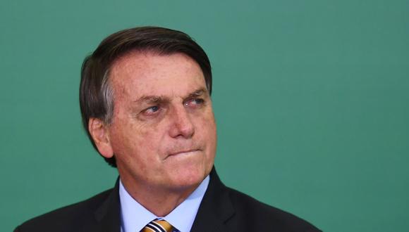 Jair Bolsonaro insistió en que si el país aún no cuenta con antídotos aprobados no es por responsabilidad de las autoridades. (Foto: EVARISTO SA / AFP)