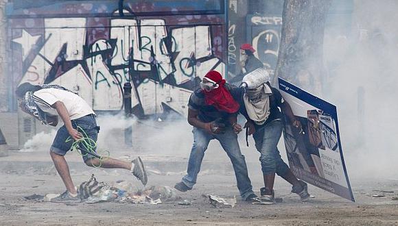 A pesar de las violentas protestas, Nicolás Maduro se niega a dialogar con entidades foráneas. (Reuters)