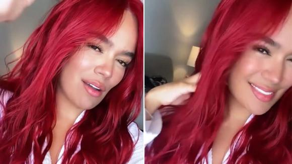 Karol G looks happy with her red hair