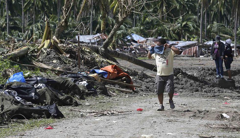 La cifra de víctimas mortales por el paso del devastador tifón \"Bopha\" en Filipinas aumentó a más de 546. (AP)
