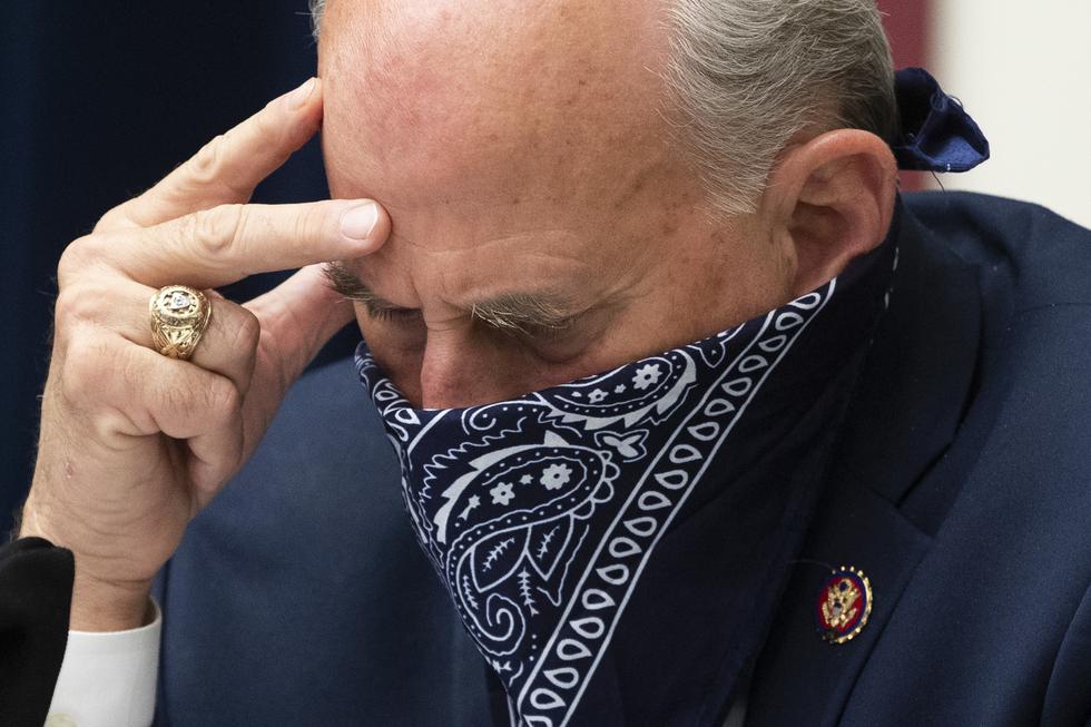 Republican Representative of Texas Louie Gohmert uses a face covering during the US House Natural Resources Committee hearing on "The US Park Police Attack on Peaceful Protesters at Lafayette Square", on Capitol Hill in Washington, DC, on June 29, 2020. (Photo by MICHAEL REYNOLDS / POOL / AFP)