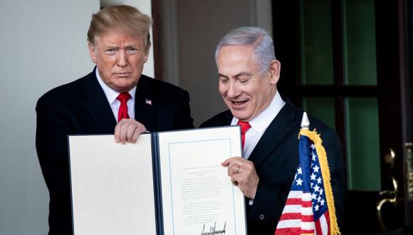 El presidente Trump firmó hoy un decreto sobre el reconocimiento de la soberanía israelí sobre los Altos del Golán. (Foto: AFP)