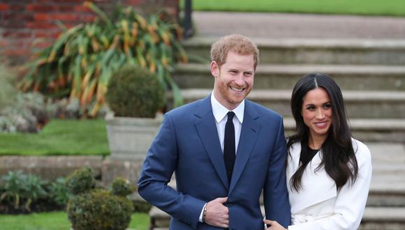 El príncipe Harry y Meghan Markle, una pareja moderna incómoda con la etiqueta y la presión. (AFP)