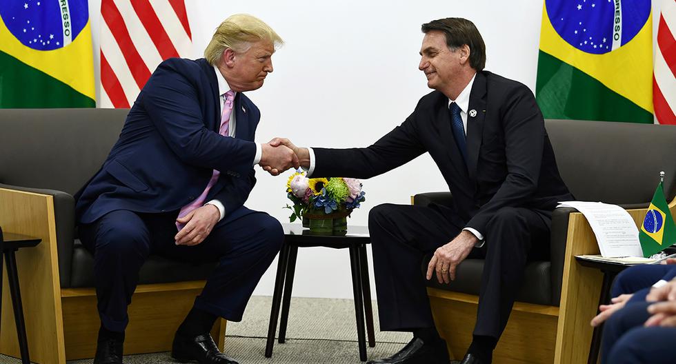 Imagen referencial. Los presidentes de Estados Unidos y Brasil, Donald Trump y Jair Bolsonaro, durante una reunión bilateral al margen de la Cumbre del G20 en Osaka. (Foto: AFP).