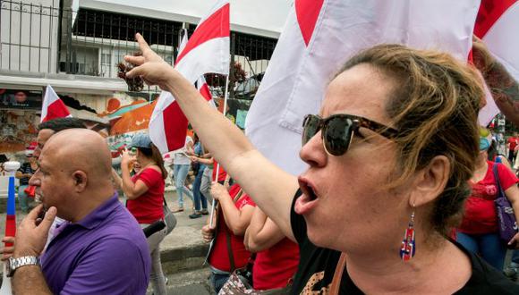 Funcionarios costarricenses se manifestaron durante una huelga contra la propuesta tributaria, que se está discutiendo en el Congreso en San José. (Foto: AFP)