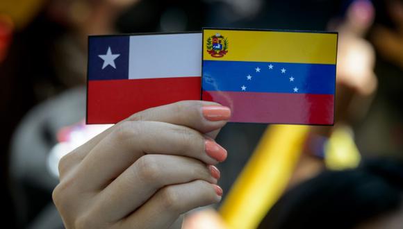 Recibieron el inmueble representantes de la Comisión Presidencial para la Diáspora Venezolana, ente conformado por varias organizaciones y fundaciones de venezolanos que residen en Chile. (Foto: AFP)