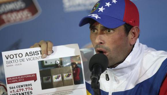 CONTRA EL FRAUDE. Henrique Capriles denunció más de 3,200 irregularidades en la jornada electoral. (AP)
