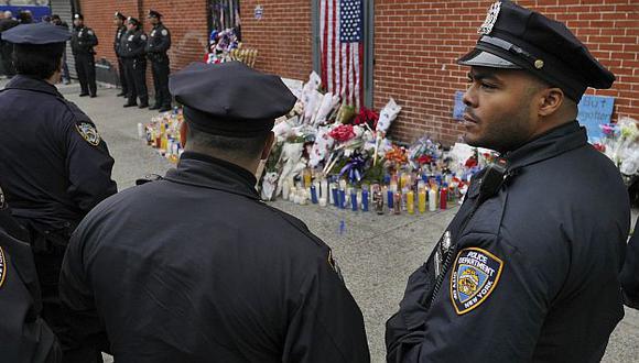 Conmoción y rabia en Nueva York tras el asesinato de dos policías. (AP)