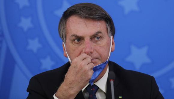 Luiz Henrique Mandetta consideró que ese doble discurso del Gobierno confunde al brasileño porque “no sabe si escucha al ministro de Salud” o “si escucha al presidente”. (AFP)