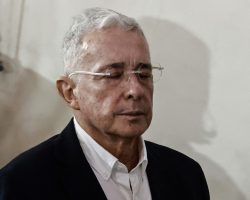 (FILES) Colombia'S former President Alvaro Uribe attends a mass at the San Jose Church in Medellin, Colombia, on July 27, 2025. A Colombian court on August 1, 2025, sentenced still-powerful former president Alvaro Uribe to 12 years of house arrest after he was found guilty of witness tampering, a legal source told AFP. The sentence, which is due to be publicly announced later on Friday, marks the first time in Colombia's history that a former president has been convicted of a crime and sentenced. Uribe, now 73-years old, insists he is innocent and is expected to appeal the ruling. (Photo by Jaime SALDARRIAGA / AFP)